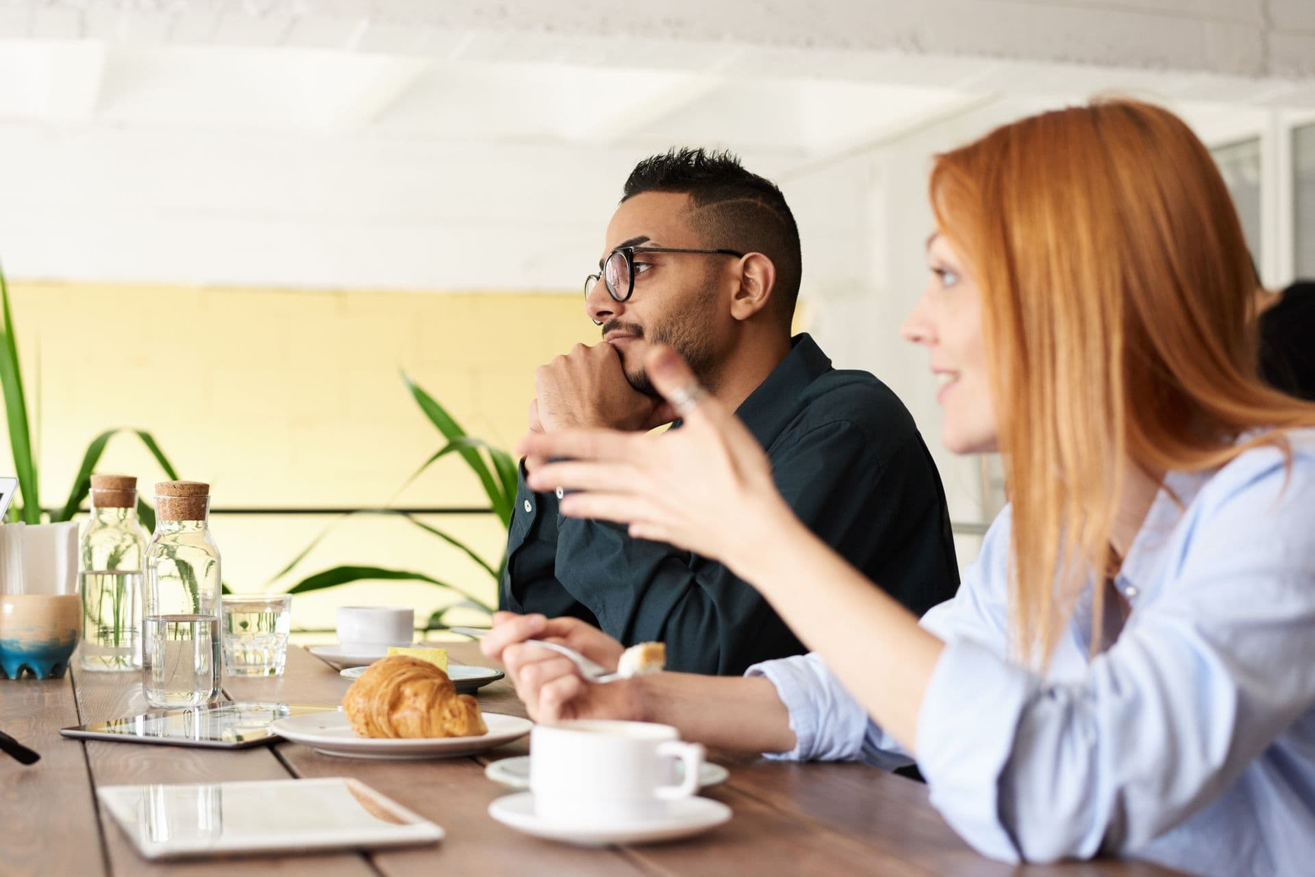 Colleagues planning an event over coffee